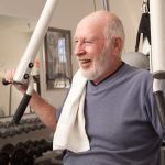 Senior Adult Man Working Out in the Gym.